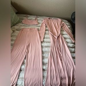Three-piece matching pink lounge set with a robe….pants…..& cropped tank